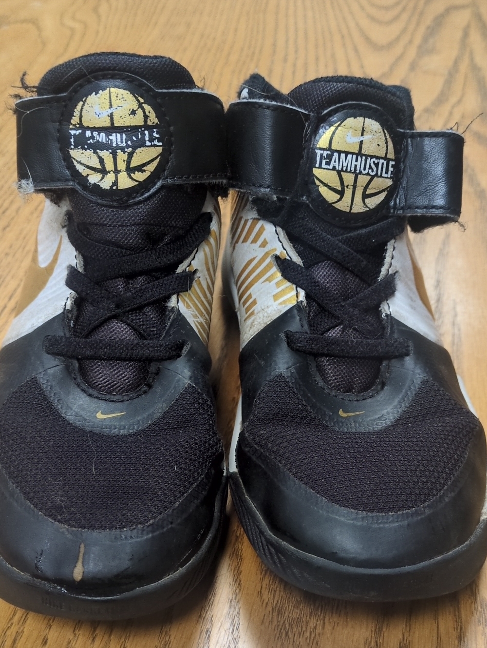 Nike Kids Black and Gold TeamHustle Velcro Basketball Sneakers